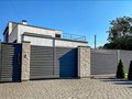 ISOTECH : spécialiste des portes industrielles, portes de garage, portails et clôtures en Moselle